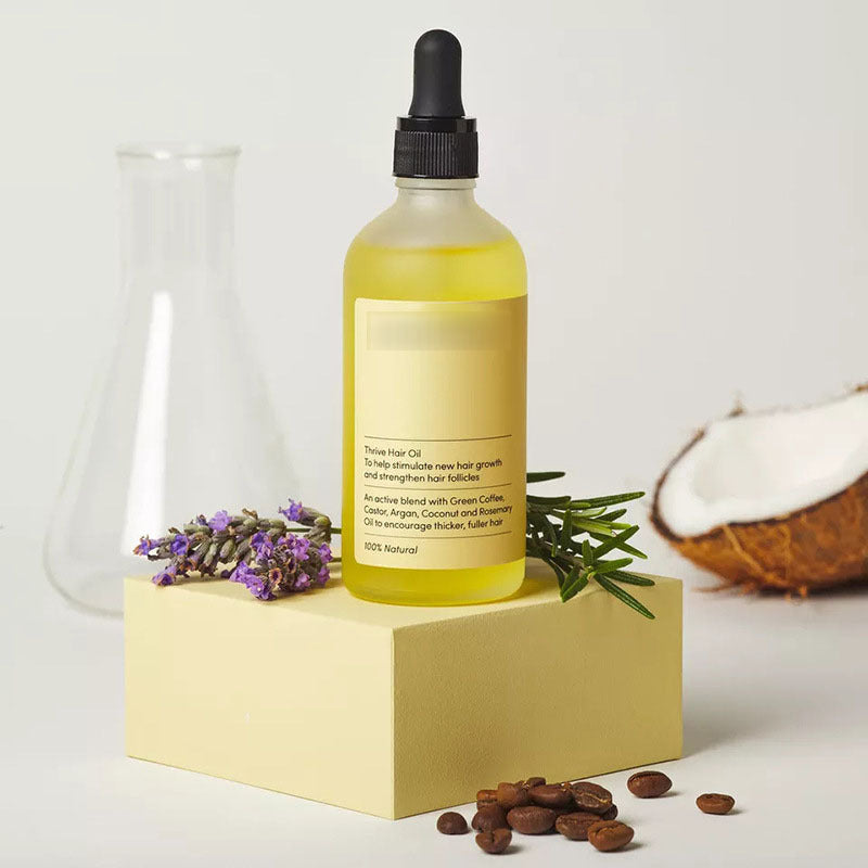 Natural hair growth serum Thrive Hair Oil